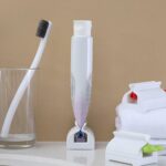 Toothpaste Squeezer Bathroom Tube Easy Stand Dispenser Rolling Holder Seat AU - Image 2